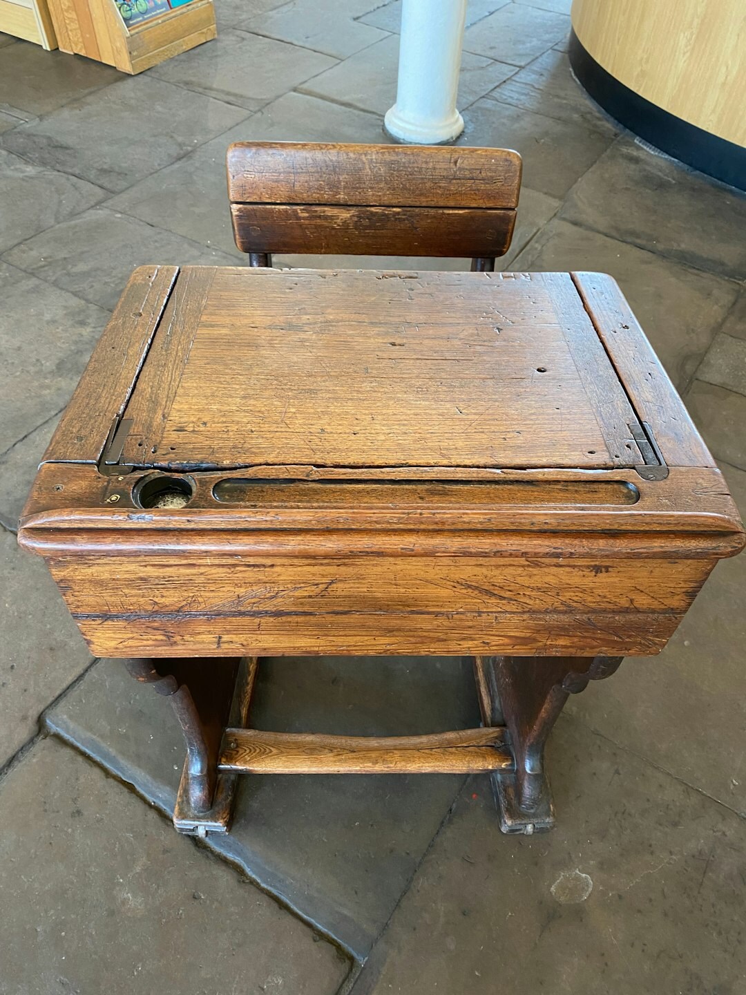 Antique wooden writing desk with typewriter and manuscript pages